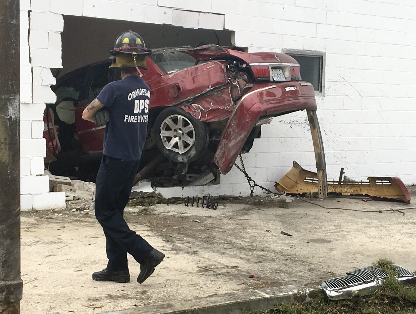 Car Crashes into Building